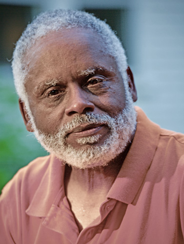 A photo of author Michael Cameron Ward, a black man.